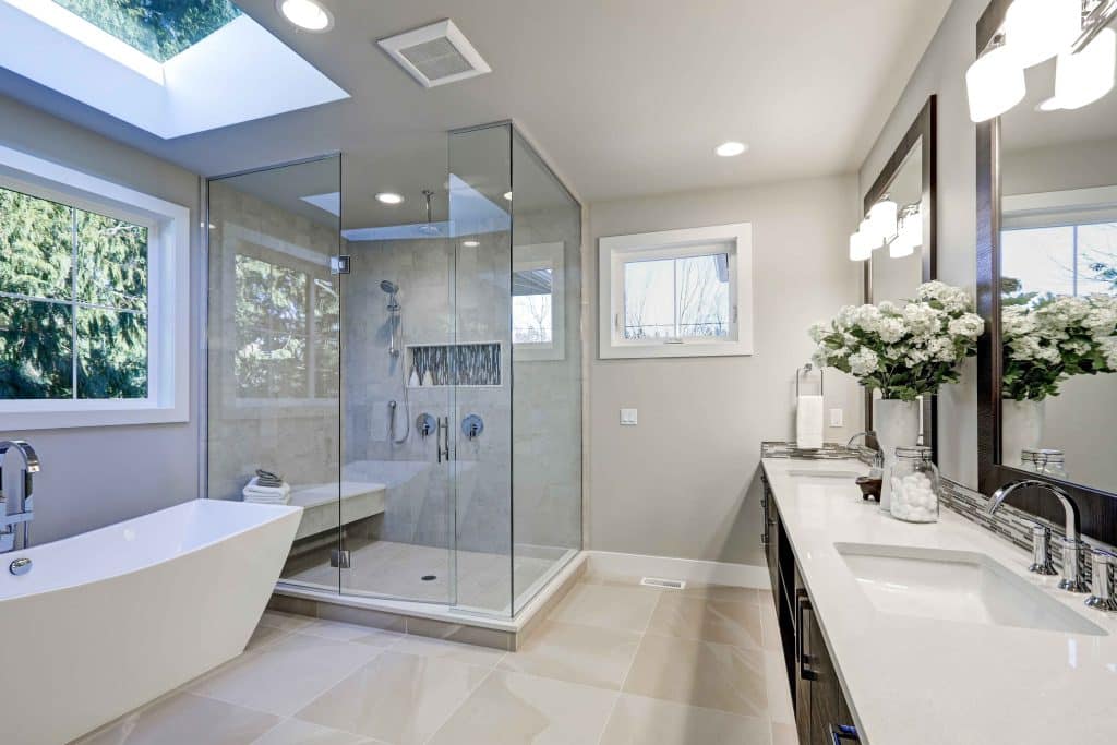 Bathroom reno with glass shower enclosure.